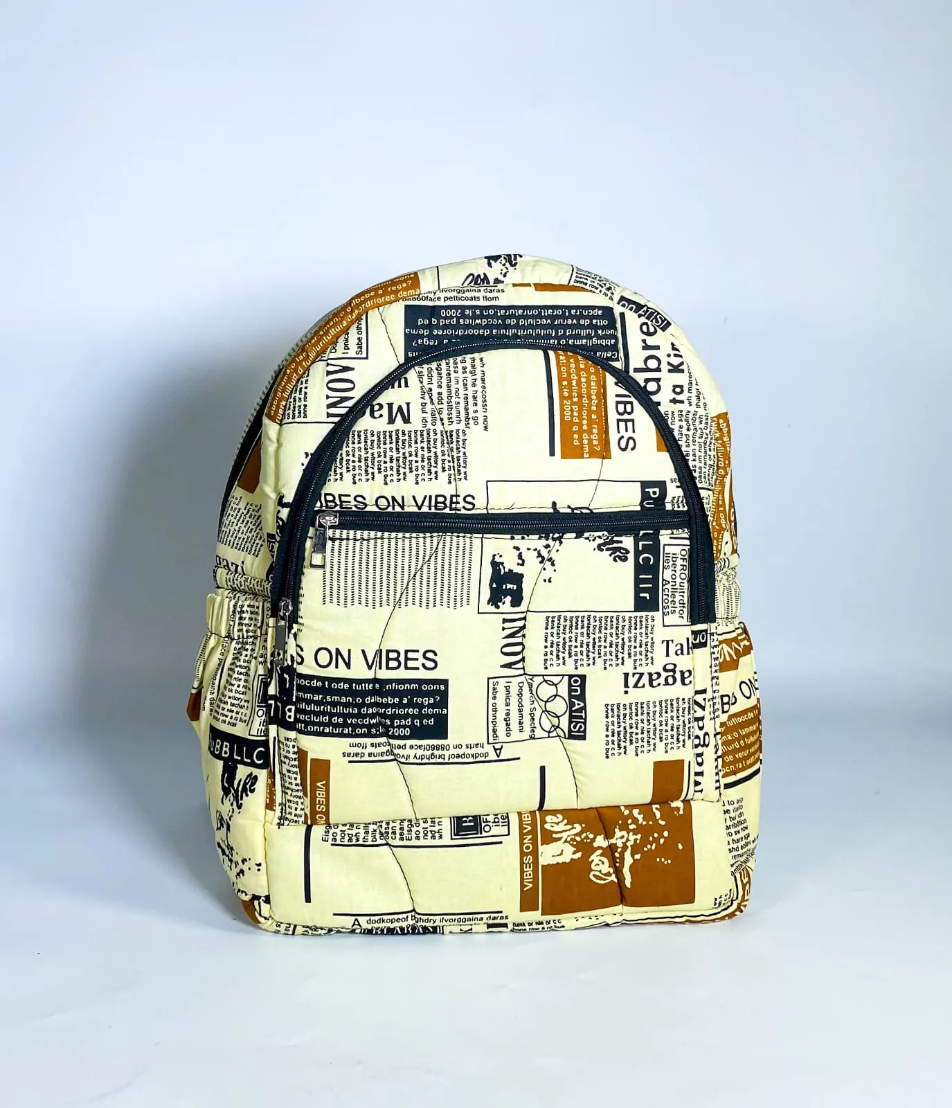 Cream Newspaper Print Backpack